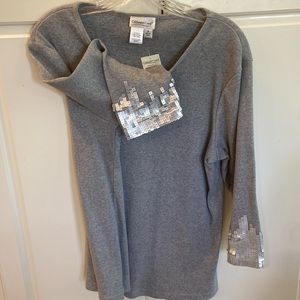 NWT ladies top with sequin detail on sleeves. Size 1X.